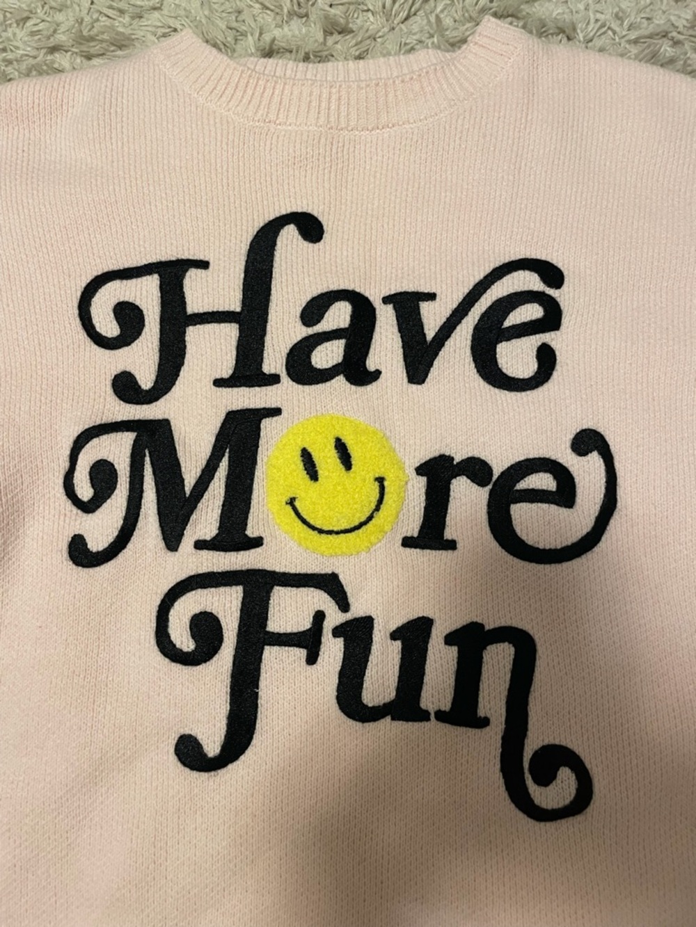 moon & madison Pink Sweater with Black Lettering and Yellow Smiley